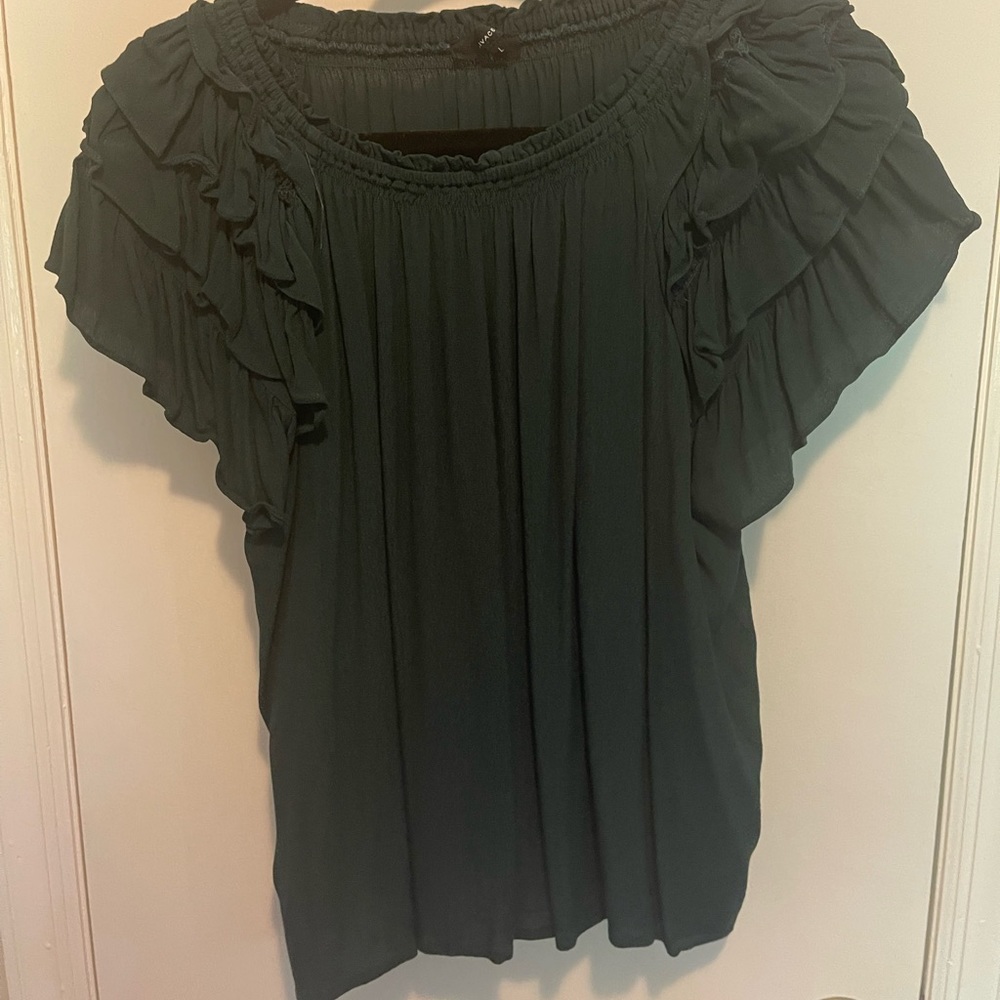 Green top with flowy shoulders.